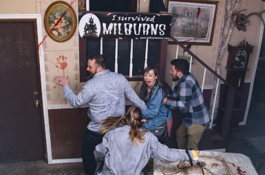 Photograph of scared 2 men and 1 woman