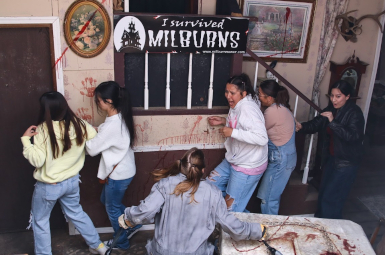Photograph of scared 5 women