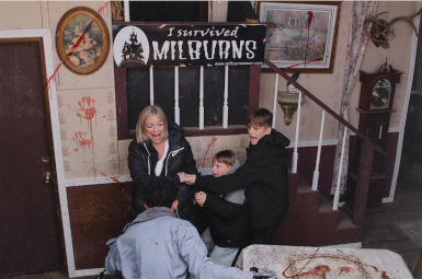 Photograph of scared mother and two sons